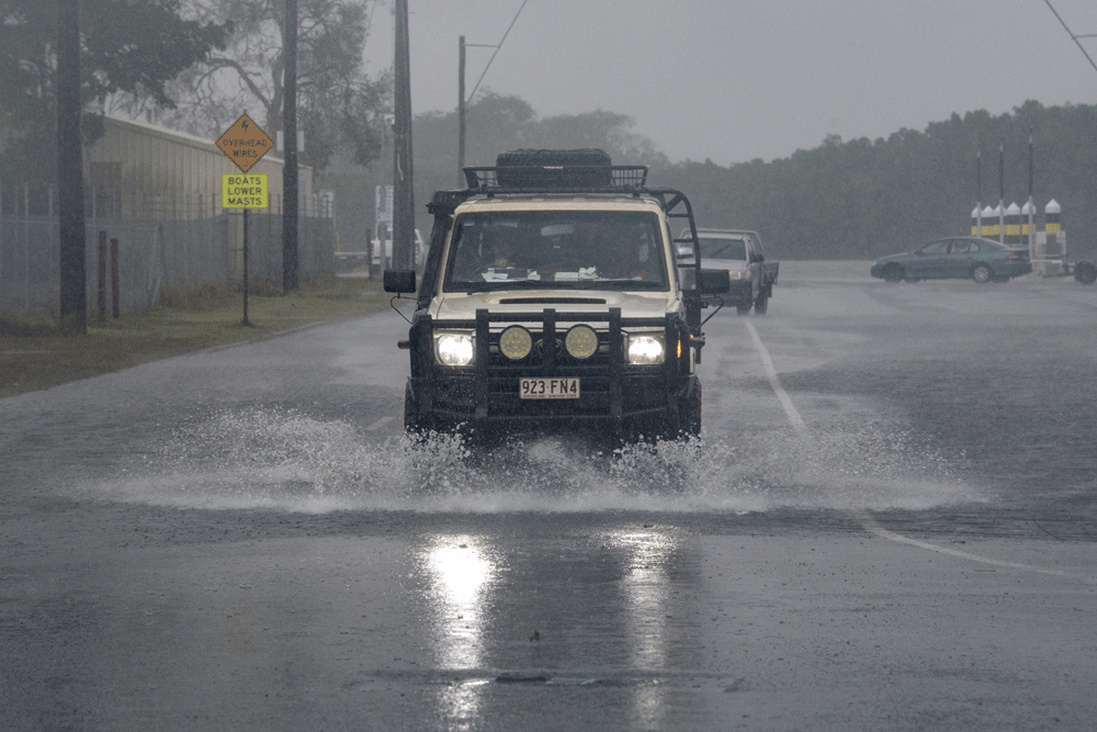 Woman dead, 120,000 without power as damaging storms hit Australia