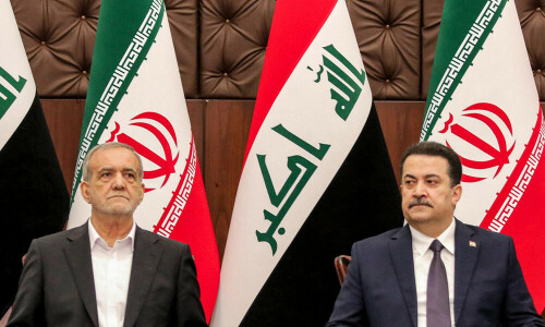 Iran president says 14 agreements signed with Iraq to expand ties