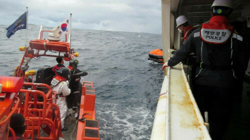 South Korean coast guard rescues 8 people on capsized fishing boat, Yonhap says
