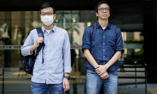 Hong Kong court jails former editor for sedition, releases another on health grounds