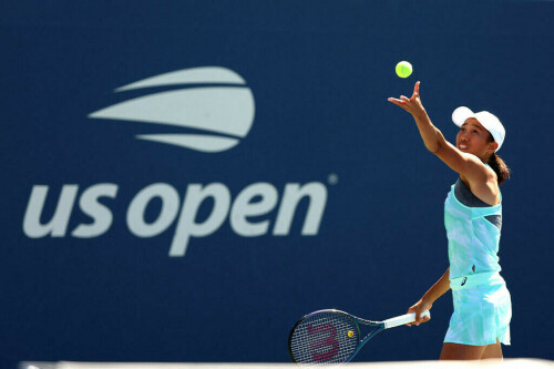 Defiant history-maker Zhang Shuai powers into Beijing last eight
