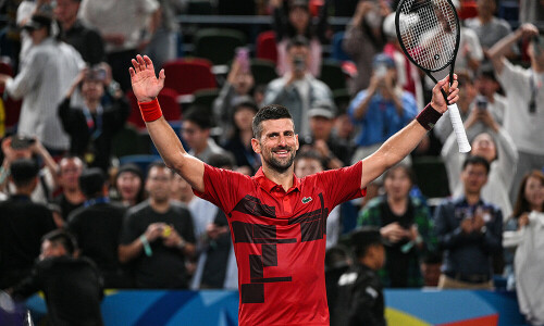 Djokovic &lsquo;shakes rust off&rsquo; to make third round of Shanghai Masters