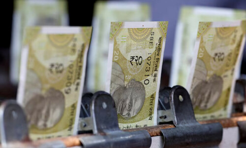 Dollar pullback to help Indian rupee, weak risk appetite to weigh
