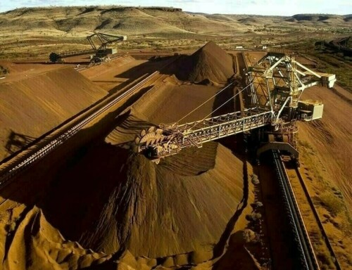 Iron ore falls on weaker global steel outlook, China growth forecasts