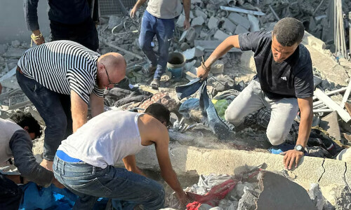 Israeli airstrikes kill at least 30 Palestinians in Gaza, medics say