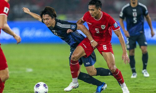 Ruthless Japan beat China to move to brink of World Cup qualification