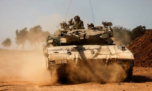 Israeli tanks retreat from central Gaza camp, medics say 30 killed