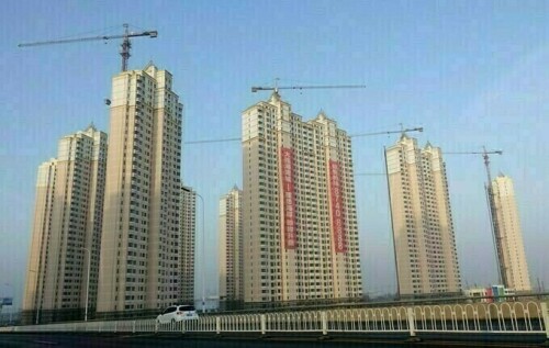 China new home price rises accelerate in November, survey finds