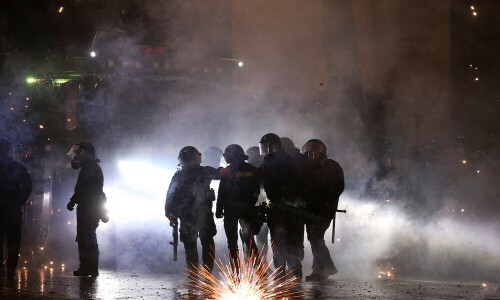 Georgia police fire tear gas to scatter protesters, Russian agencies say