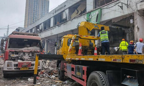Powerful blast rocks residential high-rise in southern China, kills one person