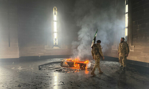 Tomb of Assad&rsquo;s father set on fire in Syria hometown: AFP