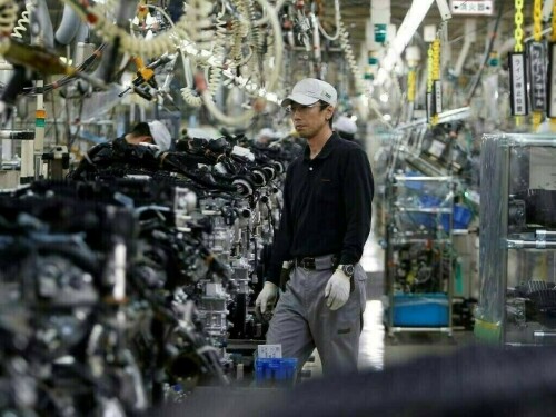 China November industrial output rises 5.4%, above expectations