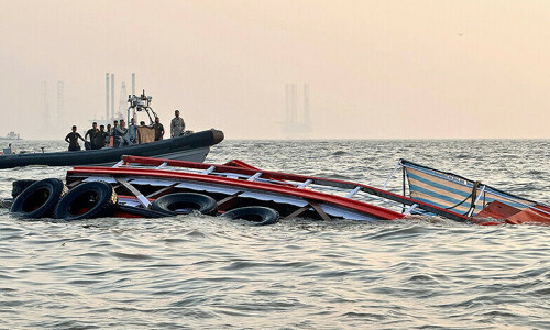 Divers, helicopters hunt survivors of Mumbai boat accident that killed 13