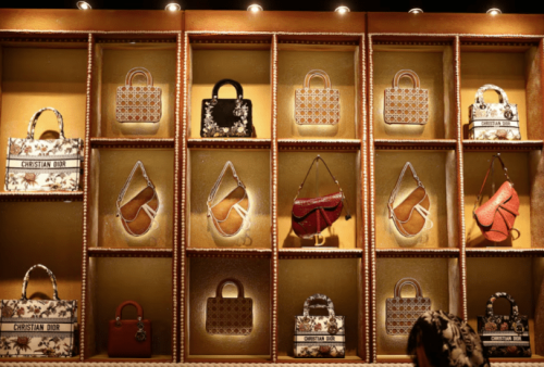 Luxury labels focus on lower-priced goods to appeal to middle-class shoppers Luxury labels focus on lower-priced goods to appeal to middle-class shoppers