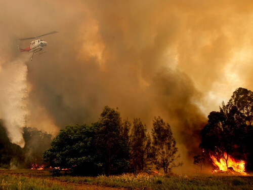 Out-of-control Australia bushfire will burn for days, officials say