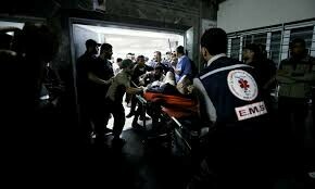 Gaza medics struggle to rescue patients after Israel orders hospital evacuated