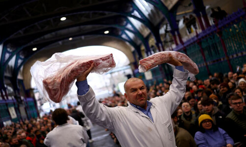 Punters throng London&rsquo;s historic Christmas meat auction