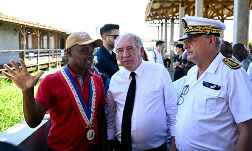 French premier promises concrete aid for cyclone-hit Mayotte