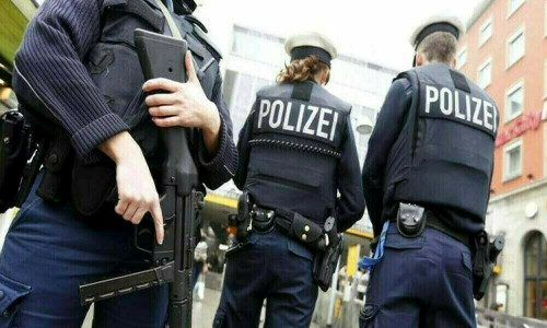 Two German officers injured in explosion outside police building Two German officers injured in explosion outside police building