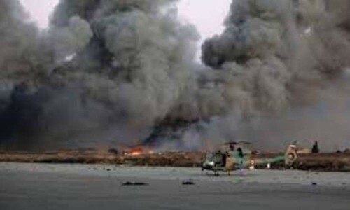 Syria monitor reports blasts at arms depots near Damascus