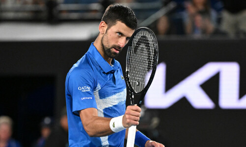 Record-setting Novak Djokovic trumps Federer on way to Melbourne third round