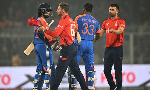 Sharma, bowlers help India thrash England in T20 opener
