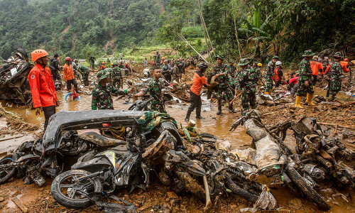 Indonesia landslide death toll rises to 22 as search paused
