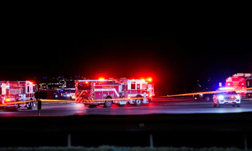 Three soldiers were on board US Army BlackHawk helicopter involved in collision, official says