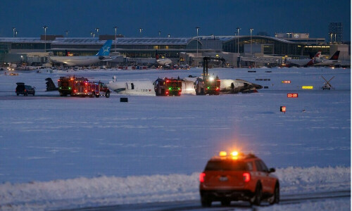 Delta plane flips upside down on landing at Toronto airport, injuring 18