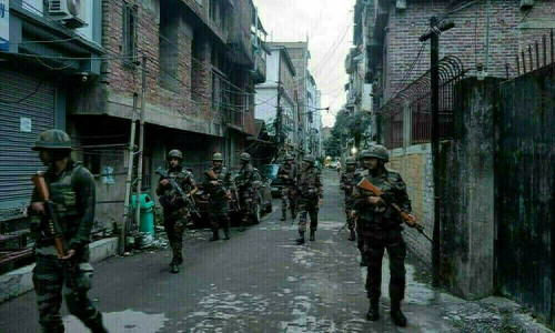Militia fighters surrender looted weapons in restive Indian state