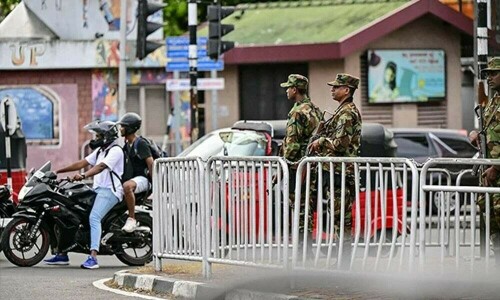 Sri Lanka hunts for police chief over deadly raid