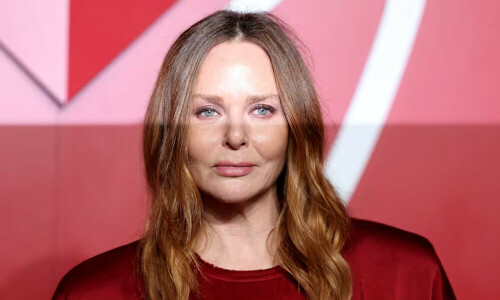 Stella McCartney shows feminine power suits in office set at Paris Fashion Week Stella McCartney shows feminine power suits in office set at Paris Fashion Week