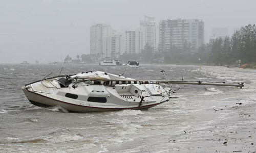 Thousands of Australians without power as storm Alfred lashes Queensland