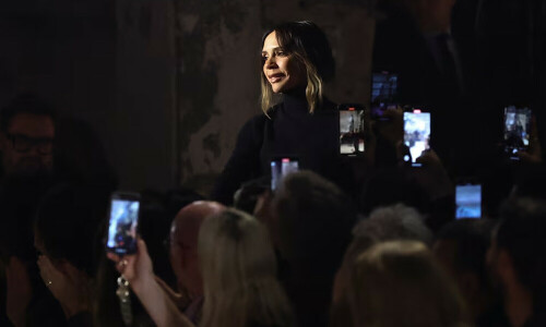 Victoria Beckham shows curled hems and collars at Paris Fashion Week