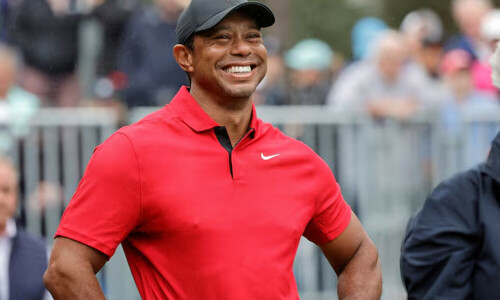 Obamas in talks to produce Tiger Woods film