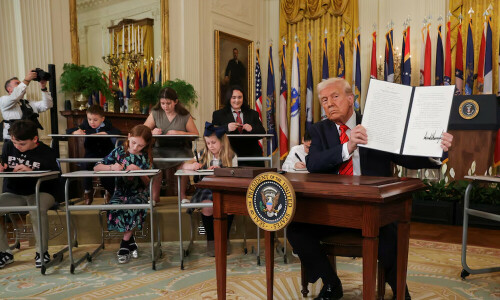 Trump signs order aimed at dismantling US Department of Education