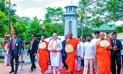 India’s Modi praises close Sri Lanka ties at holy tree