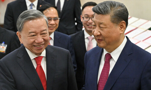 China, Vietnam sign deals as Xi visits Hanoi amid US tariff tensions