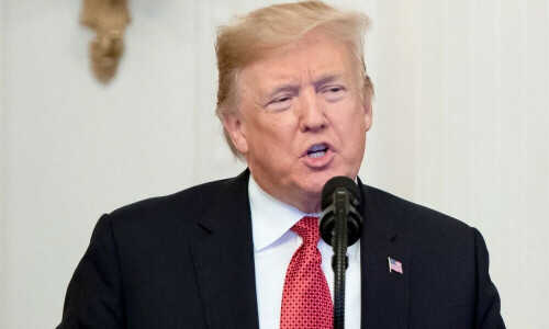 Trump threatens to strip defiant Harvard of tax-exempt status