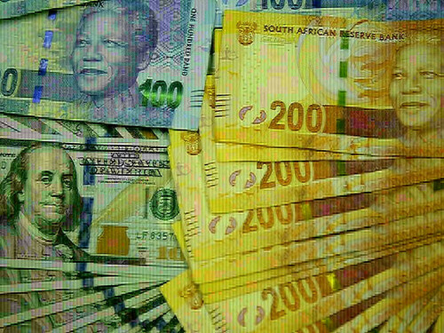 South African rand firms, markets await clarity on tariffs and local politics