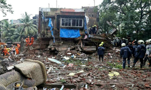 At least 11 killed in India building collapse