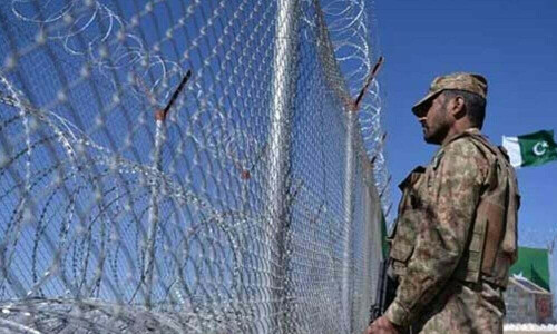 Pakistan official says overnight exchange of fire at border with India
