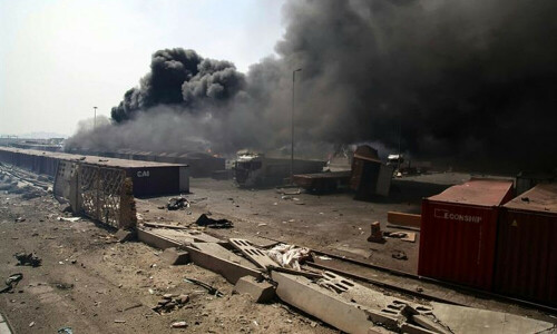 Fire rages after blast at Iran port kills 8, injures hundreds