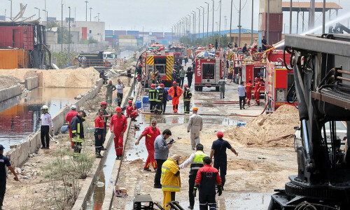 Iran minister blames &lsquo;negligence&rsquo; for port blast that killed 65