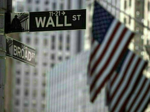 Wall St mixed in start to busy week for earnings, data
