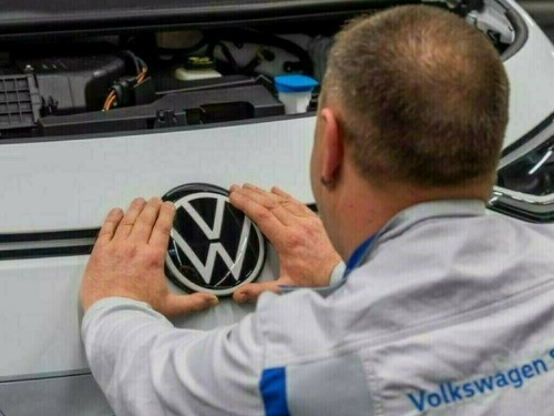 Volkswagen says trade tensions, EV costs to weigh on profits