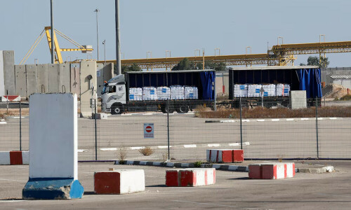 Aid trucks enter Gaza after delays, as pressure mounts on Israel
