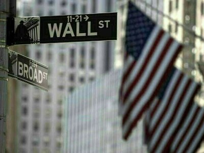 Wall St falls after Moody’s surprise downgrade