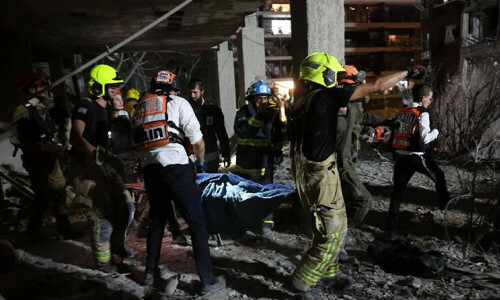 First responders say 14 injured by Iranian missile hit on Israeli home