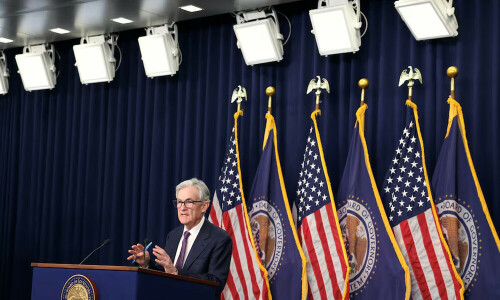 Fed keeps rates unchanged, sees two cuts in 2025 but less easing in later years